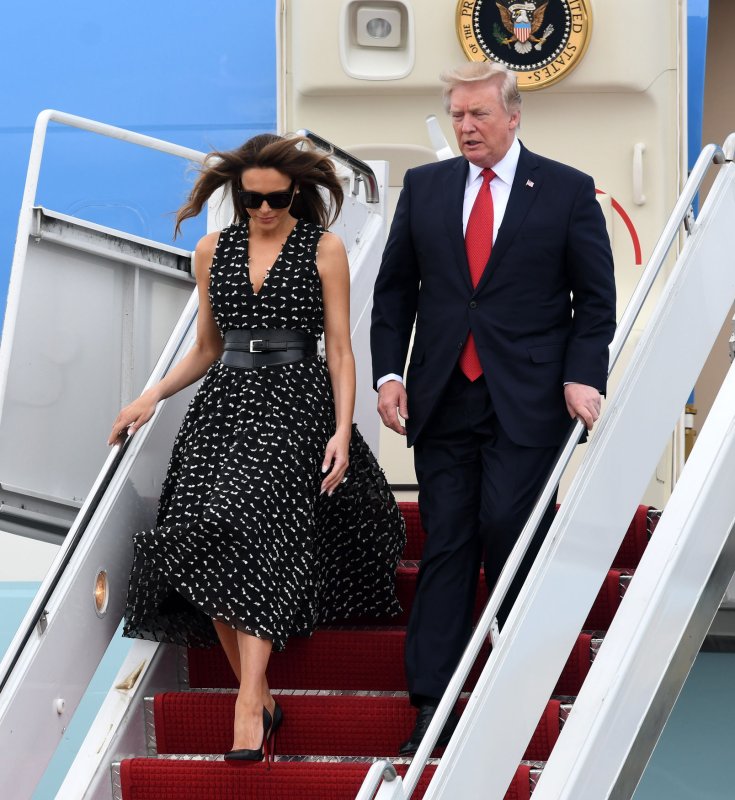 President Donald Trump and First Lady Melania Trump exit Air Force One at Atlantic Aviation in West Palm Beach, Fla., on April 6 during one of his visits to his Mar-a-Lago estate. Photo by Gary I Rothstein/UPI