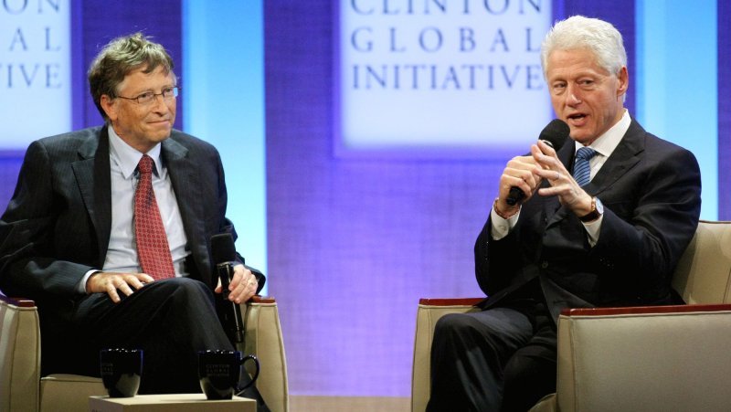 Former President Bill Clinton (R) talks as Bill Gates, founder of the Bill & Melinda Gates Foundation, listens during the closing plenary session at the sixth annual meeting of the Clinton Global Initiative on September 23, 2010 in New York. UPI/Monika Graff