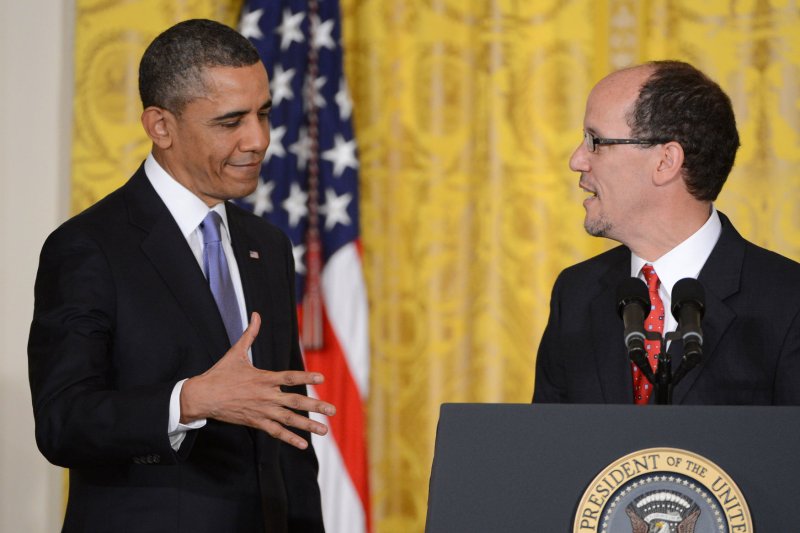 President Barack Obama (L) shakes hands with Thomas Perez as his nominee to be the new Secretary of Labor at an event in the East Room of the White House in Washington, DC on March 18, 2013. Perez is the present U.S. assistant attorney general heading the Justice Department's civil rights division, and if confirmed will take the position recently held by Hilda Solis, who resigned in January. UPI/Pat Benic | <a href="/News_Photos/lp/5fa37e5ba50348298964f90d725f110c/" target="_blank">License Photo</a>