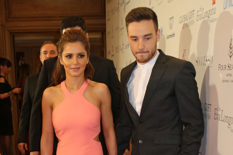 Liam Payne (R) and Cheryl Cole attend the Global Gift gala on May 9, 2016. The singer sparked marriage rumors while discussing his move to Los Angeles on Tuesday. File Photo by David Silpa/UPI