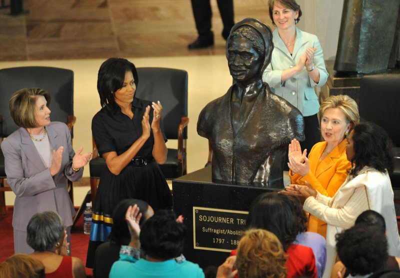 Speaker of the House Nancy Pelosi (L), First Lady Michelle Obama (2nd-L), Secretary of State Hillary Clinton (D-NY) (2nd-R) and Rep. Sheila Jackson-Lee (D-TX) participate in the unveiling of a bust of abolitionist and suffragist Sojourner Truth in the Capitol Visitors Center in Washington on April 28, 2009. (UPI Photo/Kevin Dietsch) | <a href="/News_Photos/lp/20836a883c6f28e570384870bd1ae63a/" target="_blank">License Photo</a>