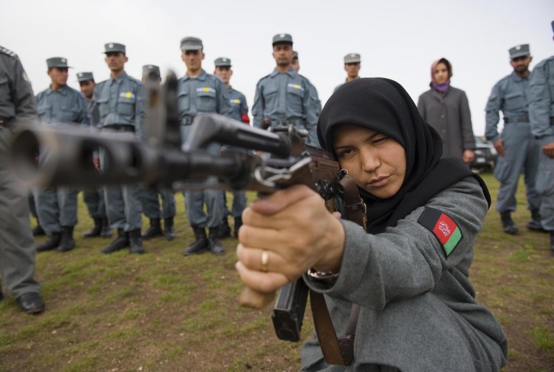 Afghan police officers train in Herat, Afghanistan, on April 21, 2010. NATO defense ministers have approved a mission to train the Afghan police in paramilitary skills in a bid to cut the force's soaring death rate. UPI/Hossein Fatemi