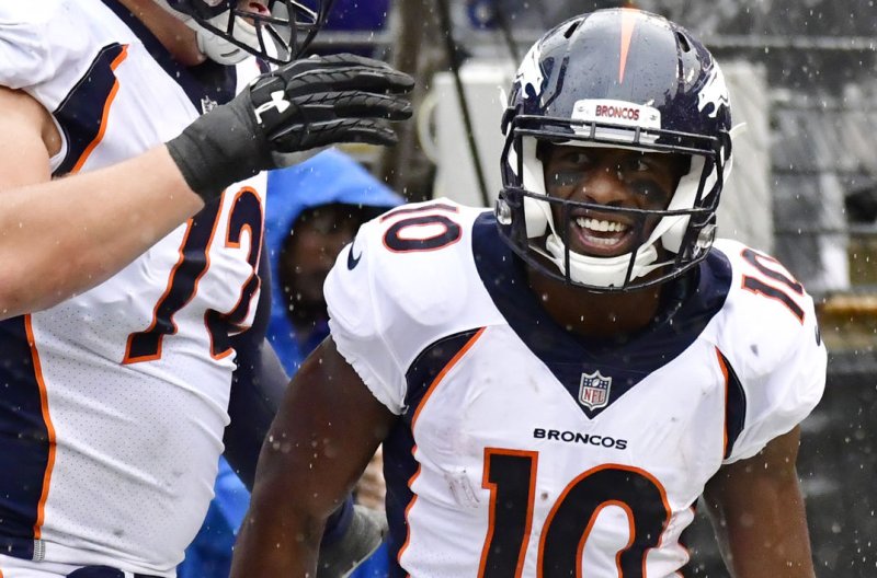 Denver Broncos wide receiver Emmanuel Sanders (10) previously said he would not restructure his contract. The Broncos picked up his one-year option Monday, giving him $1.5 million guaranteed of his $10.25 million salary. File Photo by David Tulis/UPI