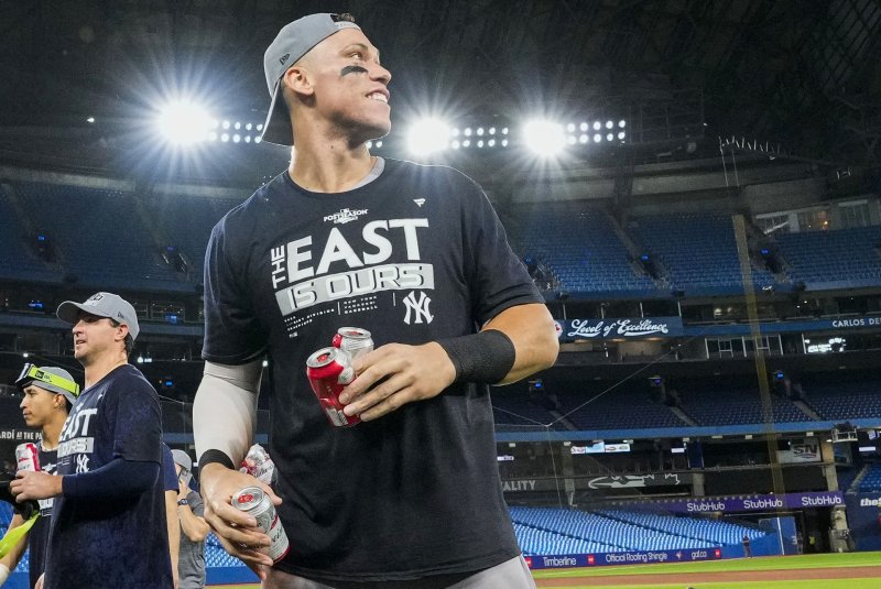 New York Yankees outfielder Aaron Judge celebrates on the field after defeating the Toronto Blue Jays to clinch the American League East division title Tuesday at Rogers Centre in Toronto. Photo by Andrew Lahodynskyj/UPI | <a href="/News_Photos/lp/8e2e500164ea3bd5f5115e30a1ab457a/" target="_blank">License Photo</a>