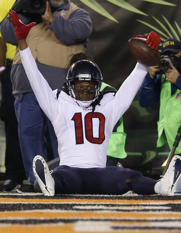 Houston Texans wide receiver DeAndre Hopkins (10) celebrates a touchdown catch. Photo by John Sommers II/UPI