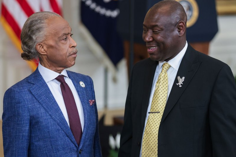 Attorney Ben Crump released part of an independent autopsy on Dexter Wade that showed he had ID in his front pocket. Crump is representing Dexter Wade's mother, Bettersten. Crump, seen here with the Rev. Al Sharpton, spoke at an event where President Joe Biden signed a historic executive order to advance effective, accountable policing and strengthen public safety in May 2022. File Photo by Oliver Contreras/UPI