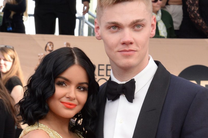 Ariel Winter (L) and Levi Meaden attend the Screen Actors Guild Awards on January 29. The couple had cheese and peanut butter inked on their fingers this week. File Photo by Jim Ruymen/UPI