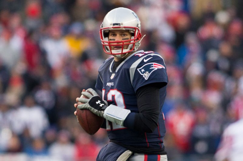 New England Patriots quarterback Tom Brady (12) drops back for a pass in the fourth quarter against the Buffalo Bills at Gillette Stadium in Foxborough, Massachusetts on December 24, 2017. File photo by Matthew Healey/UPI