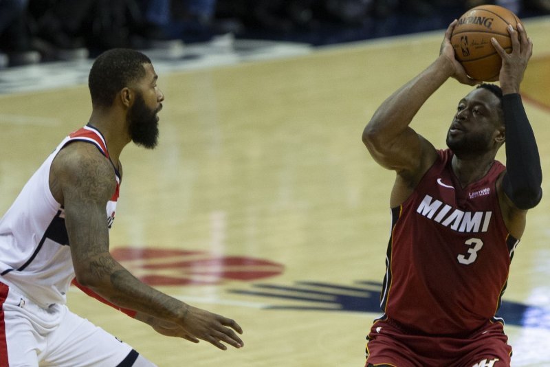 Wade, Heat return to Chicago