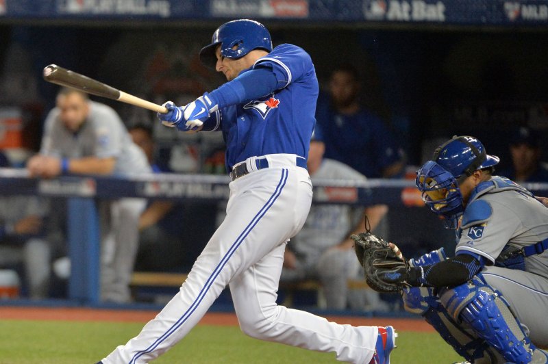 Toronto Blue Jays shortstop Troy Tulowitzki hits a three-run double with the bases loaded against the Kansas City Royals during the sixth inning in the ALCS game 5 at the Rogers Centre in Toronto, Canada on October 21, 2015. Kansas City holds a 3-1 series lead over Toronto. Photo by Kevin Dietsch/UPI