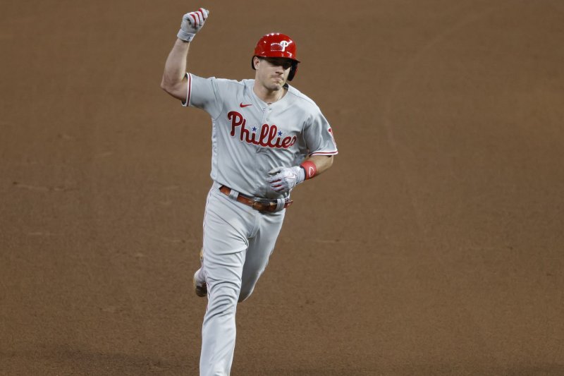 Philadelphia Phillies catcher J.T. Realmuto runs the bases after hitting a go-ahead home run in the 10th inning against the Houston Astros in Game 1 of the 2022 World Series on Friday in Houston. Photo by John Angelillo/UPI | <a href="/News_Photos/lp/93559adf228526661bcf71844b3dca7d/" target="_blank">License Photo</a>