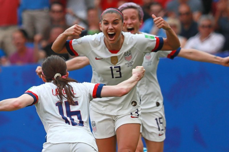 United States Women's National Team striker Alex Morgan (C) will join teammate Abby Dahlkemper on the roster of the NWSL's San Diego Wave. File Photo by David Silpa/UPI
