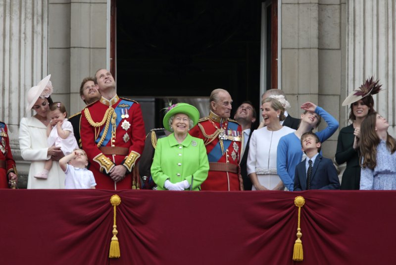 Camilla,The Duchess of Cornwall, Catherine,Duchess of Cambridge,Princess Charlotte,Prince George,Prince Harry,William Duke of Cambridge,Her Majesty the Queen,Duke of Edinburgh,Sophie Countess of Wessex watch the flypast from the balcony of Buckingham Palace at the annual "Trooping the Colour" to celebrate the Queen's 90th birthday celebrations at The Mall in London June 11, 2016. The ceremony is Queen Elizabeth II annual birthday parade and dates back to the era of King Charles 11 Photo by Hugo Philpott/UPI