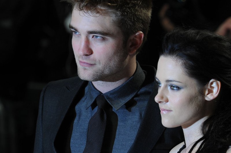 Robert Pattinson is reportedly living in Kristen Stewart's L.A. home while she's away