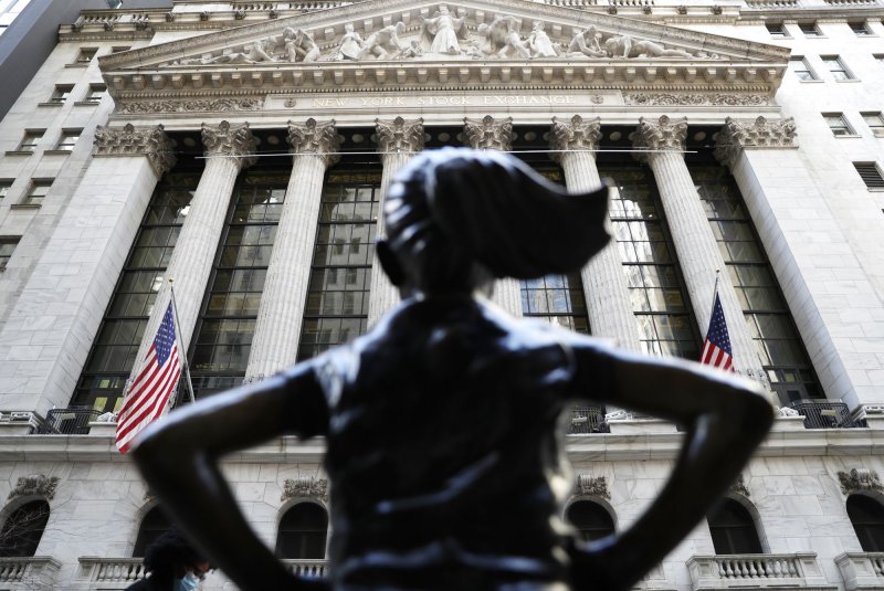 The Fearless Girl Statue faces the entrance to the NYSE after the opening bell at the New York Stock Exchange on Wall Street in New York City on Feb. 18. File Photo by John Angelillo/UPI | <a href="/News_Photos/lp/a7f3e80988d58e61d83fe918846bc2b8/" target="_blank">License Photo</a>