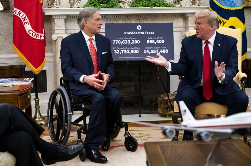 President Donald Trump meets with Texas Gov. Greg Abbott in the Oval Office in May 2020. File Photo by Doug Mills/UPI