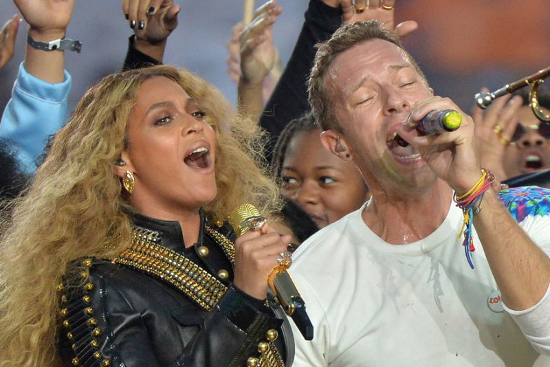 Beyonce and Coldplay's Chris Martin perform during the Super Bowl 50 halftime show on February 7, 2015. The "Formation" singer has spoken out about her intentions behind the song and controversial music video in an interview with Elle magazine. File Photo by Kevin Dietsch/UPI | <a href="/News_Photos/lp/88f746d1ca08fba86e631f861a3b726d/" target="_blank">License Photo</a>