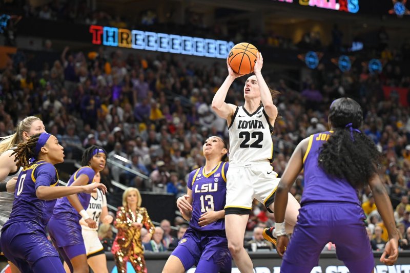 Iowa Hawkeyes guard Caitlin Clark shoots against the LSU Tigers during the first half of the 2023 NCAA Division I women's basketball title game Sunday at the American Airlines Center in Dallas. Photo by Ian Halperin/UPI