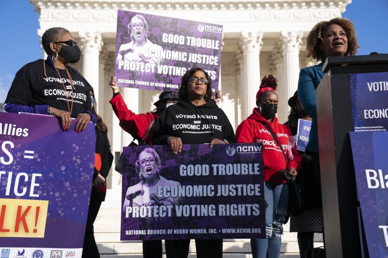 Members of the National Council of Negro Women held a rally in support of voting rights outside of the Supreme Court of the United States on Tuesday. Photo by Sarah Silbiger/UPI