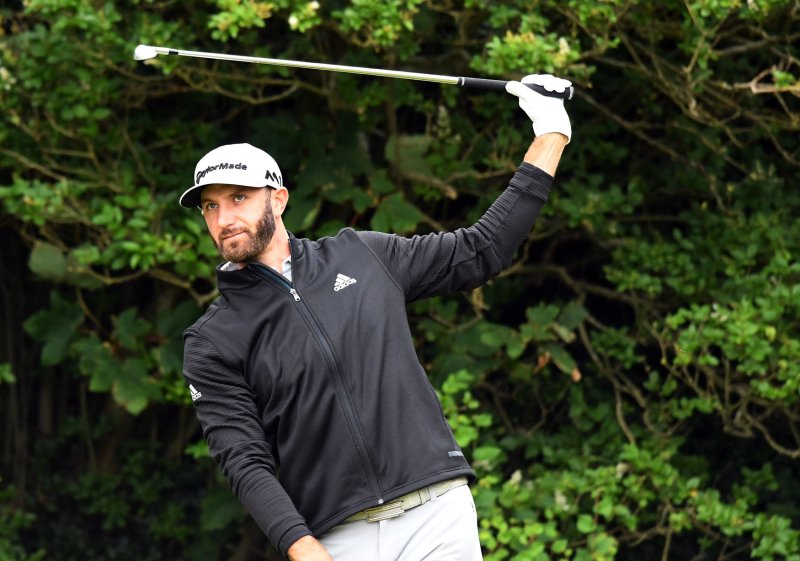 Dustin Johnson sits atop the leaderboard with three others at the Northern Trust following play Friday. Photo by Hugo Philpott/UPI