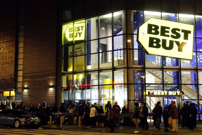 Holiday shoppers line up around the block to get Black Friday deals from Best Buy in New York City. (File/UPI/John Angelillo