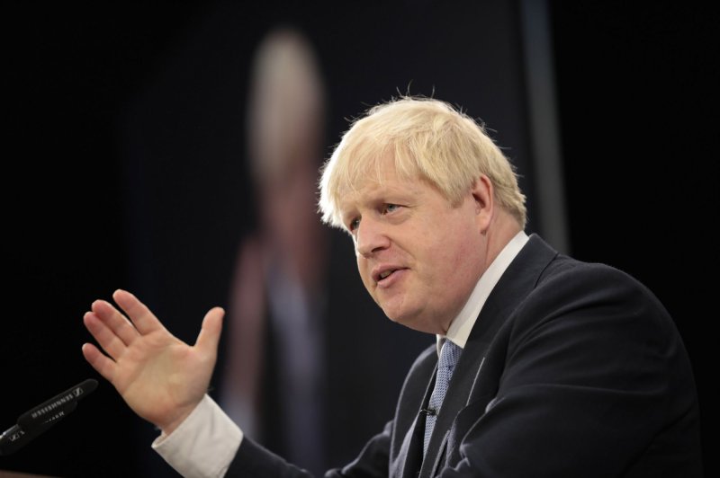 PM Boris Johnson passes new COVID-19 measures, triggering party fracture
