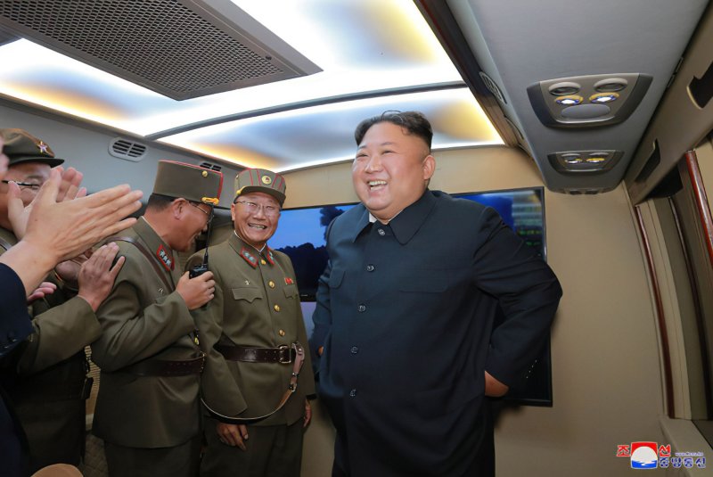 Jon Il Ho, seen here to the direct left of Kim Jong Un in this image released on Aug. 7, has been promoted to "three-star general," according to Pyongyang's state media. File Photo by KCNA/UPI | <a href="/News_Photos/lp/366f3cafcc82e04336161fd5c114bfd2/" target="_blank">License Photo</a>