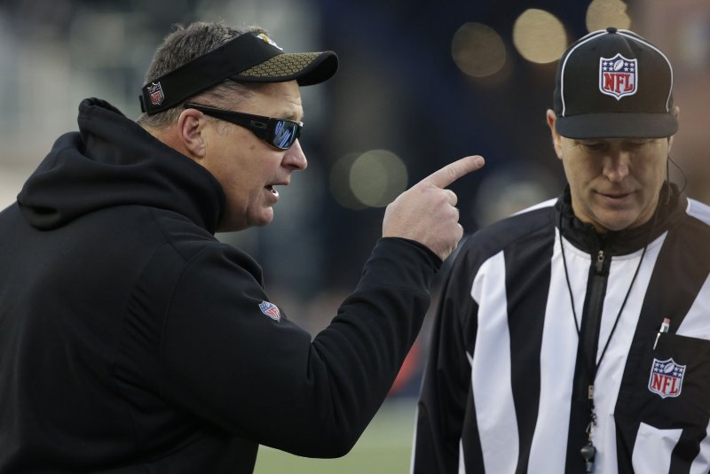 Jacksonville Jaguars head coach Doug Marrone talks to an NFL official during the second quarter of the AFC Championship game against the New England Patriots on January 21 at Gillette Stadium in Foxborough, Mass. Photo by John Angelillo/ UPI