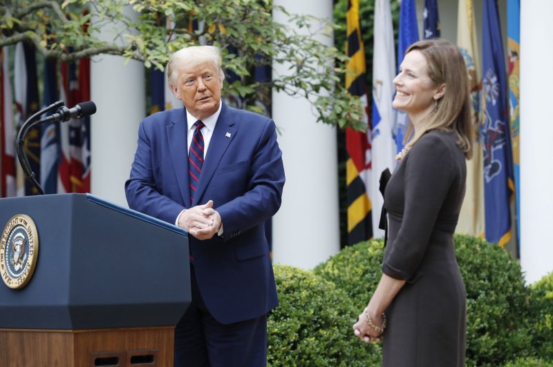 US President Donald J. Trump introduces Judge Amy Coney Barrett (R) as his nominee to be an Associate Justice of the Supreme Court during a ceremony in the Rose Garden of the White House in Washington, DC, on Saturday, September 26, 2020. Judge Barrett, if confirmed, will replace the late Justice Ruth Bader Ginsburg. Photo by Shawn Thew/UPI