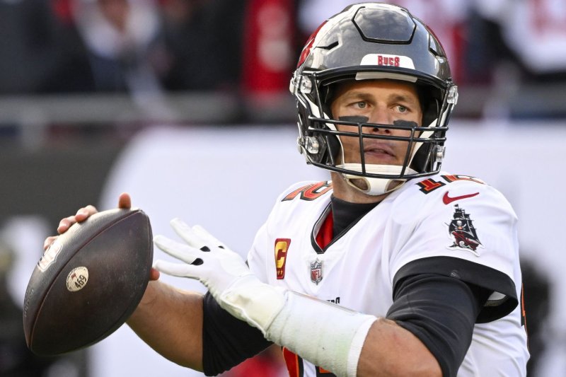 The football Tampa Bay Buccaneers quarterback Tom Brady (pictured) used to throw a touchdown pass to wide receiver Mike Evans in a playoff game Jan. 23, in Tampa, Fla., sold at an auction for $518,000 because it was marketed as his "final" touchdown toss. File Photo by Steve Nesius/UPI