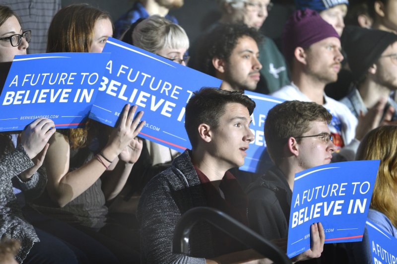 Supporters listen to Vermont Sen. Bernie Sanders at a campaign stop at Grinnell College in Grinnell, Iowa. Photo by Mike Theiler/UPI