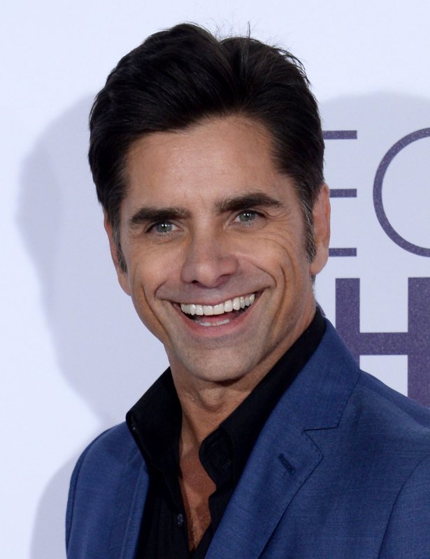 John Stamos hopes to have kids with Caitlin McHugh