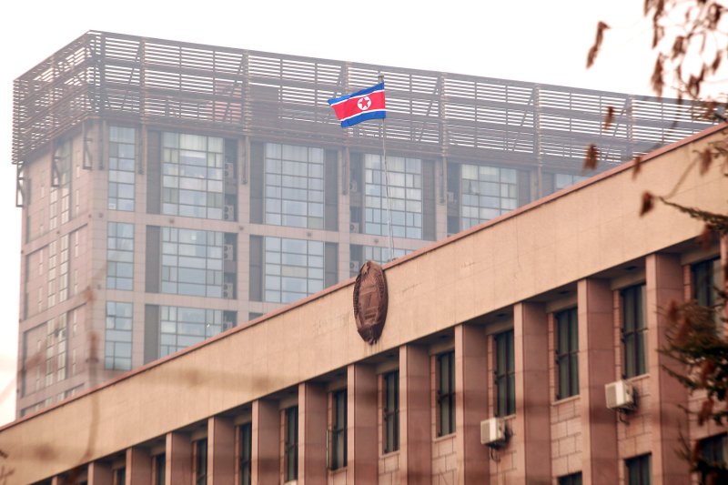 The North Korean flag flies over the North Korean embassy in Beijing. North Korea lifted a Ebola-related travel ban this week but according to tour operators a mandatory 21-day quarantine is in effect for travelers from West Africa. UPI/Stephen Shaver