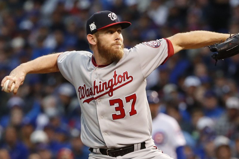 Washington Nationals pitcher Stephen Strasburg throws against the Chicago Cubs in Game 4 of the NLDS on October 11 at Wrigley Field in Chicago, Ill. Photo by Kamil Krzaczynski/UPI | <a href="/News_Photos/lp/eba4e4c7d5681e8e6996d190adf3c7e4/" target="_blank">License Photo</a>