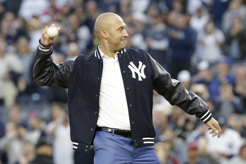 Derek Jeter throws out the first pitch after a ceremony retiring his number before the Houston Astros play the New York Yankees at Yankee Stadium on May 14 in New York City. File photo by John Angelillo/UPI