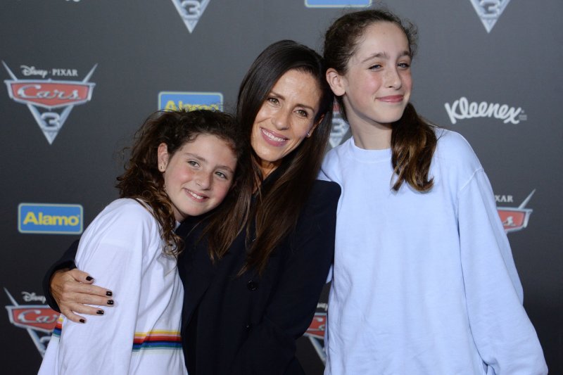 Soleil Moon Frye (C), pictured with daughters Poet and Jagger, will star in a "Punky Brewster" reboot. File Photo by Jim Ruymen/UPI