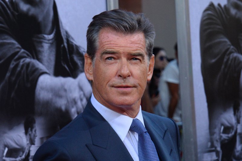 Pierce Brosnan at the Los Angeles premiere of 'The November Man' on August 13, 2014. The actor watched son Dylan Brosnan walk the runway for Saint Laurent on Sunday. File photo by Jim Ruymen/UPI | <a href="/News_Photos/lp/6054fec6f82954ef8f564ca66534ba1e/" target="_blank">License Photo</a>