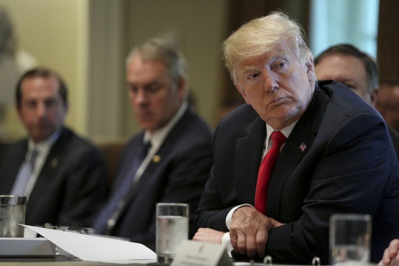 President Donald Trump listens during a Cabinet Meeting Thursday in the Cabinet Room of the White House. Photo by Oliver Contreras/UPI | <a href="/News_Photos/lp/b1e1ec478e8e891f746fc2f0e53f4fbf/" target="_blank">License Photo</a>