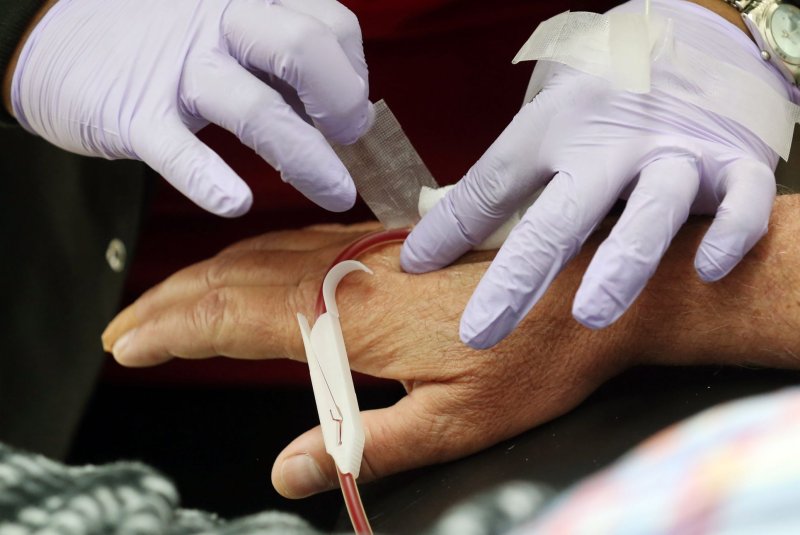 The NIH halted a study using blood plasma from recovered COVID-19 patients to prevent severe disease in other patients because it was ineffective. File photo by Bill Greenblatt/UPI