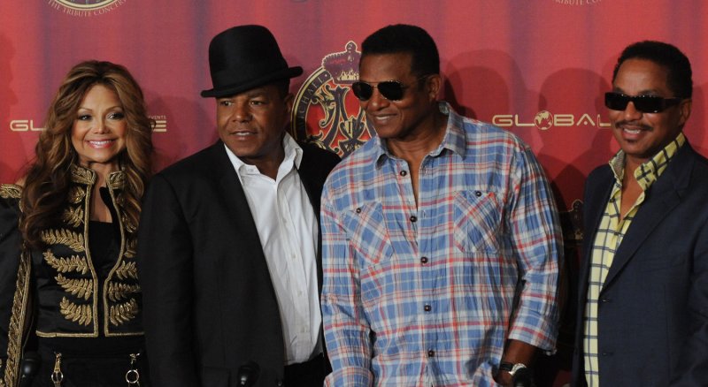Four of the middle children of the Jackson family: LaToya, Tito , Jackie and Marlon Jackson (L-R) pose together during a press conference in Beverly Hills California. (File/UPI/Jim Ruymen)