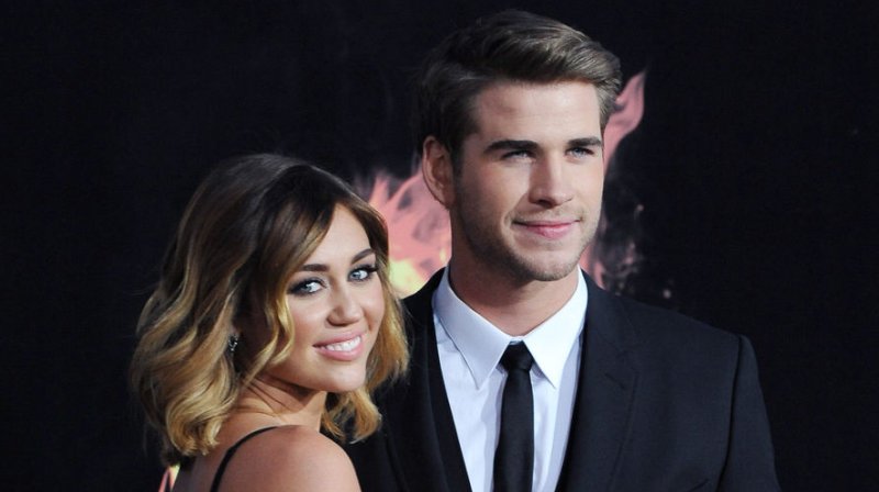 Actor Liam Hemsworth, a cast member in the motion picture sci-fi thriller "The Hunger Games", attends the premiere of the film with singer and actress Miley Cyrus at Nokia Theatre in Los Angeles on March 12, 2012. UPI/Jim Ruymen