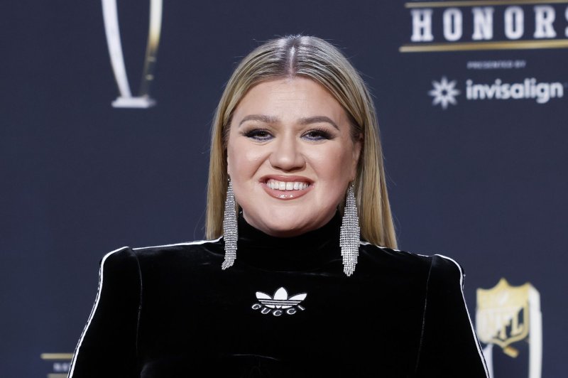 Kelly Clarkson arrives on the red carpet at the 12th annual NFL Honors in Phoenix, Ariz., on February 9, 2023. Clarkson just released a new single "I Hate Love" that features banjo playing by Steve Martin. File Photo by John Angelillo/UPI