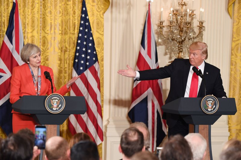 British Prime Minister Theresa May and President Donald Trump respond to a question during a joint press conference in the East Room of the White House on Friday. During the briefing, which followed May's first meeting with Trump as U.S. president, expressed hope that British-U.S. relations will improve under their leadership. Photo by Pat Benic/UPI | <a href="/News_Photos/lp/d89f6e116f16ff2659dc3695dff414f0/" target="_blank">License Photo</a>