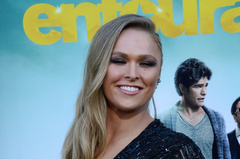 Cast member Ronda Rousey attends the premiere of the motion picture comedy "Entourage" at the Regency Village Theatre in the Westwood section of Los Angeles on June 1, 2015. Storyline: Movie star Vincent Chase, together with his boys Eric, Turtle, and Johnny, are back - and back in business with super agent-turned-studio head Ari Gold on a risky project that will serve as Vince's directorial debut. Photo by Jim Ruymen/UPI