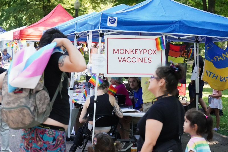 Signs attract visitors to a tent where the Monkeypox vaccine is being given during the Tower Grove Pride in St. Louis on September 25. The CDC said Thursday that the Jynneos vaccine offers protection against the virus, which has been renamed mpox. File photo by Bill Greenblatt/UPI