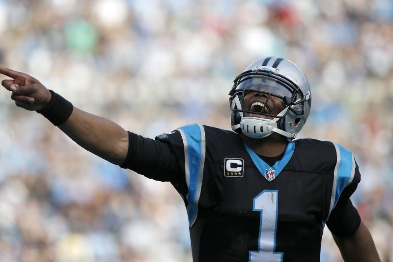 Carolina Panthers quarterback Cam Newton celebrates after the Panthers score in the second half of an NFL football game at Bank of America Stadium in Charlotte, North Carolina on December 13, 2015. Carolina won 38-0. UPI/Nell Redmond .