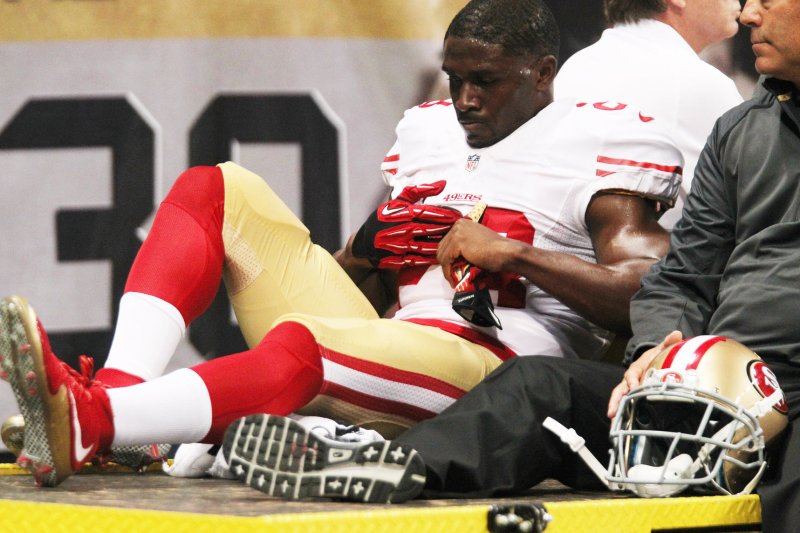 San Francisco 49ers Reggie Bush is taken off the field on a cart after injuring his knee returning a punt in the first quarter against the St. Louis Rams, at the Edward Jones Dome in St. Louis on November 1, 2015. Bush is the second player in two weeks to be injured falling on concrete behind the players bench. On October 25, 2015, Cleveland Brown's quarterback Josh McCown skidded into the wall. The NFL League office has asked the Rams to look into improved player safety. Photo by Bill Greenblatt/FILES /UPI