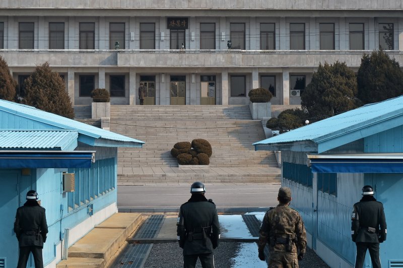 A North Korean soldier stands guard at the joint security area(JSA) of Panmunjom in the demilitarized zone (DMZ) in Paju, South Korea. North Korea said Wednesday the United States should withdraw its troops from the South. Photo by Keizo Mori/UPI