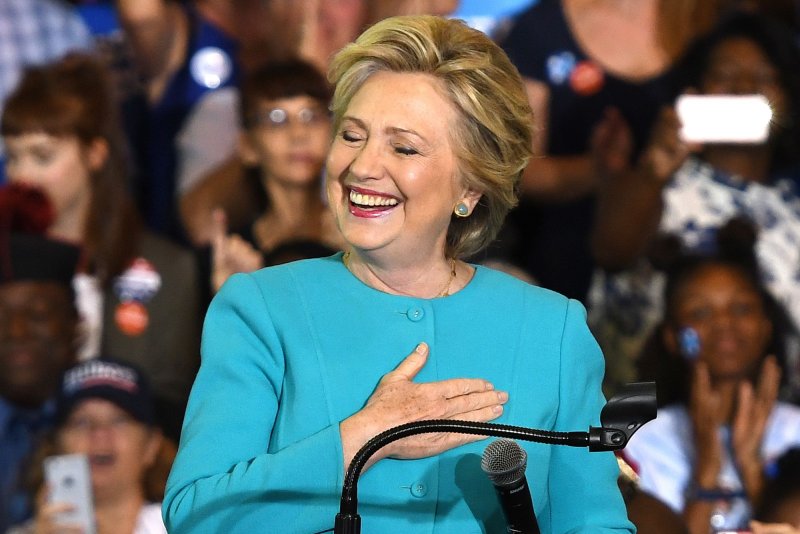 Democratic presidential nominee Hillary Clinton speaks at a rally in Lake Worth, Fla., on Monday. Clinton's financial filings three weeks prior to the election show she has a major advantage in campaign cash over he ropponent, Donald Trump. Photo by Gary I Rothstein/UPI
