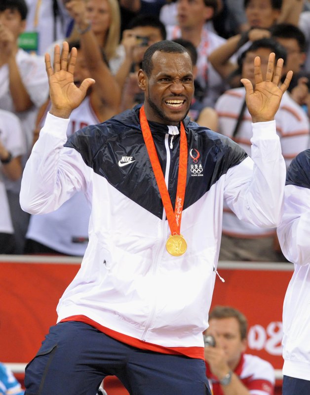 USA's Lebron James dances after receiving his medal for the win over Spain to claim the gold medal for Men's Basketball during the 2008 Summer Olympics in Beijing on August 24, 2008. The US won 118 to 107. (UPI Photo/Roger L. Wollenberg)